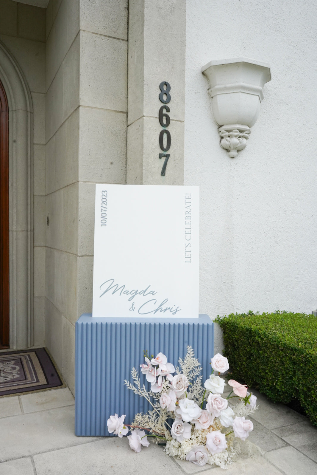 Small welcome sign faux flower arrangement