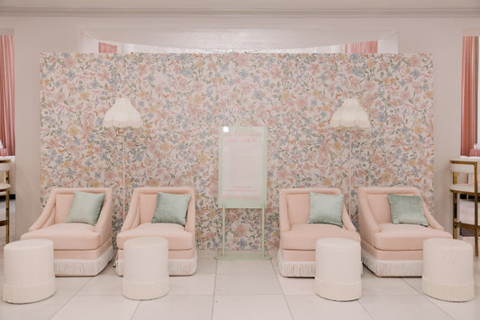 Fringed pink sofa